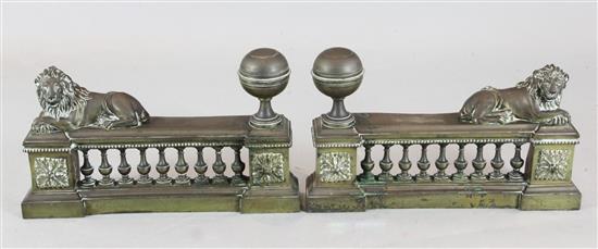 A pair of 19th century patinated brass andirons, 20in.